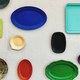 Overhead shot of colorful empty plates on table